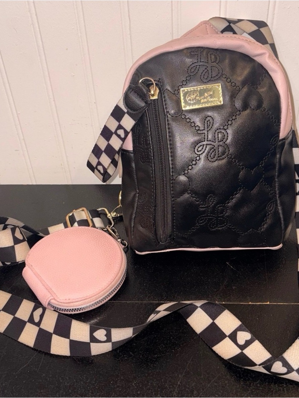 Betsey Johnson Cross body quilted
Hearted Backpack Purse